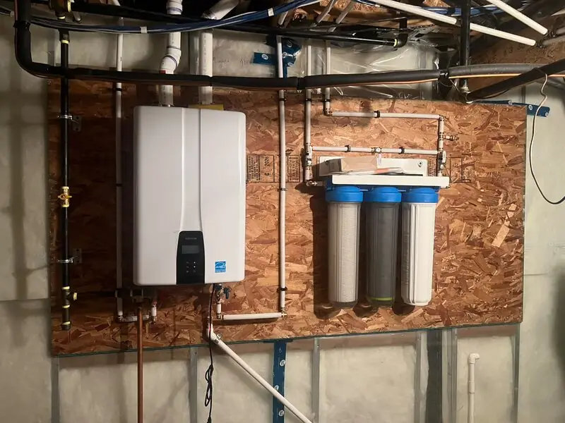 Navien tankless water heater and reverse-osmosis water filtration system installed in Aspen Woods, SW Calgary